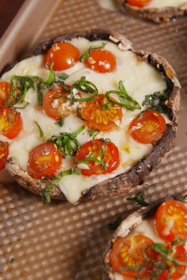 <p>A new spin on a classic flavour combination.</p><p>Get the <a href="https://www.delish.com/uk/cooking/recipes/a34615509/caprese-stuffed-mushrooms-recipe/" rel="nofollow noopener" target="_blank" data-ylk="slk:Caprese Stuffed Mushrooms;elm:context_link;itc:0;sec:content-canvas" class="link ">Caprese Stuffed Mushrooms</a> recipe.</p>