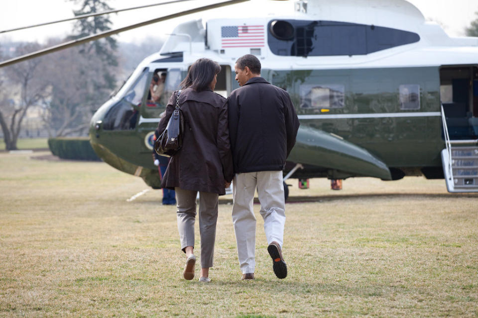 The president&nbsp;and the first lady walk to Marine One on the South Lawn before heading to Camp David on March 7, 2009.