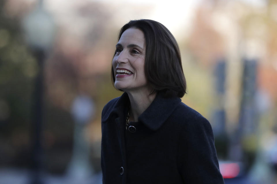 Former White House national security aide Fiona Hill arrives to testify before the House Intelligence Committee on Capitol Hill in Washington, Thursday, Nov. 21, 2019, during a public impeachment hearing of President Donald Trump's efforts to tie U.S. aid for Ukraine to investigations of his political opponents. (AP Photo/Julio Cortez)