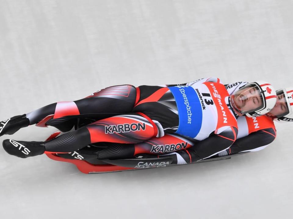 Tristan Walker (13) and Justin Snith, back, seen here on Nov. 23, 2019, have been announced for Team Canada's World Cup luge team that is focused on the Beijing Olympics. (Sebastian Widmann/Getty Images - image credit)