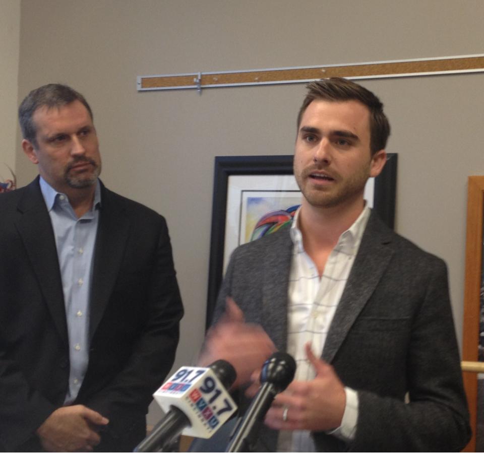 Andy Nielsen, right, president and chief executive of Everything But The House, talks about his company’s plans Tuesday after receiving $13 million in venture capital investments.