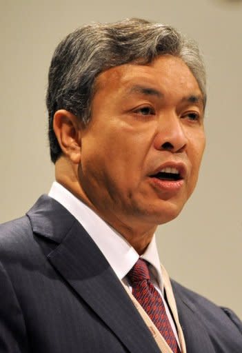 Malaysian Defence Minister Ahmad Zahid Hamidi speaks during the Asia-Pacific security forum in Singapore in 2010. A scandal linking Malaysia's leader, a young woman's murder and alleged kickbacks in a French submarine deal has resurfaced as a potential danger for the government as elections loom