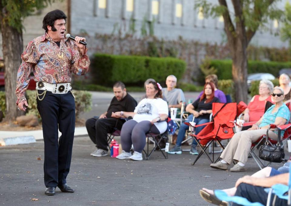 An Elvis Presley impersonator entertains the crowd at A&W on 14th and H streets Sept. 15, 2017 in Modesto, Calif.