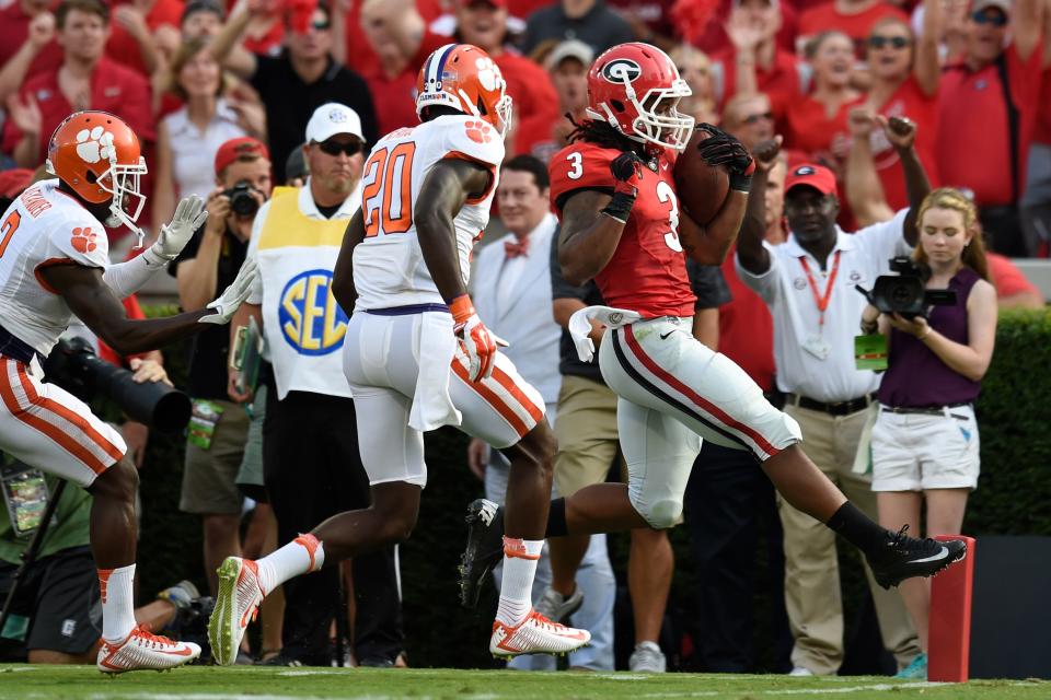 Aug 30, 2014; Athens, GA, USA; Georgia Bulldogs running back Todd Gurley (3) scores a touchdown against the Clemson Tigers during the first quarter at Sanford Stadium. Mandatory Credit: Dale Zanine-USA TODAY Sports