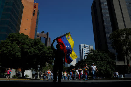 Opposition supporters take part in a rally against Venezuelan President Nicolas Maduro's government in Caracas, Venezuela February 2, 2019. REUTERS/Carlos Barria