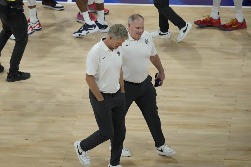 U.S. head coach Steve Kerr leaves after the Basketball World Cup bronze medal game between the United States and Canada in Manila, Philippines, Sunday, Sept. 10, 2023. (AP Photo/Aaron Favila)