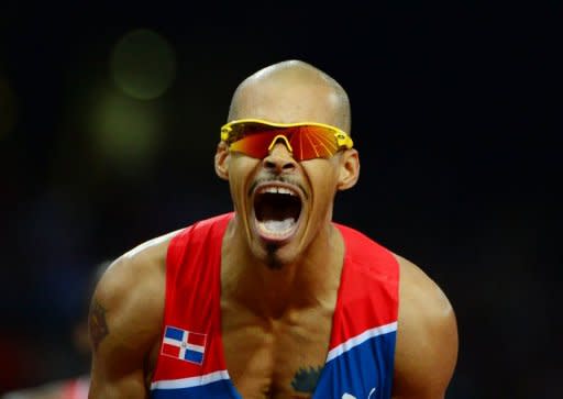 Dominican Republic's Felix Sanchez celebrates after winning the men's 400m hurdles final at the London Olympics on August 6. Sanchez defied all expectations when he regained his 400m hurdles title, at the age of 34 and after a gap of eight years