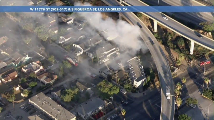 Another fire burns underneath Los Angeles freeway 