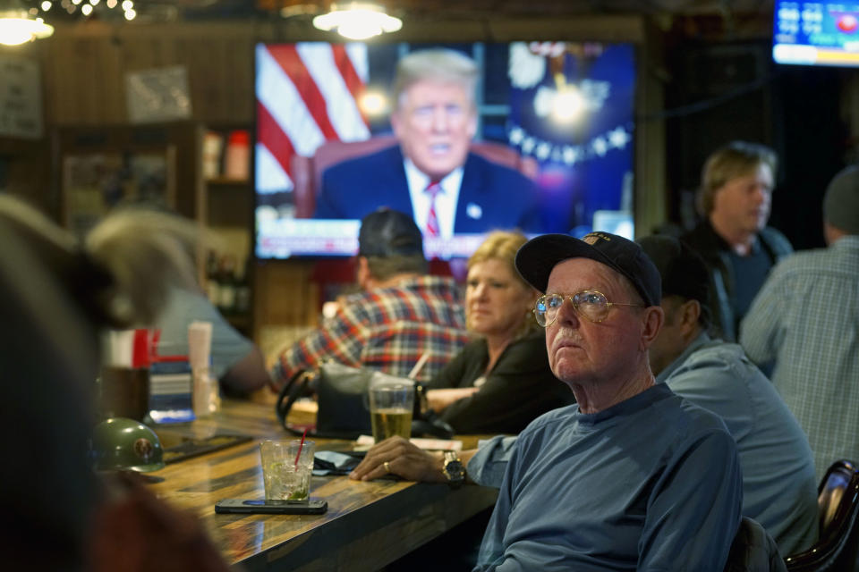 Members of American Legion Post 416 watch President Donald Trump speak on January 8, 2019 in Encinitas, California, as the shutdown drags on. (Photo: Sandy Huffaker/Getty Images)