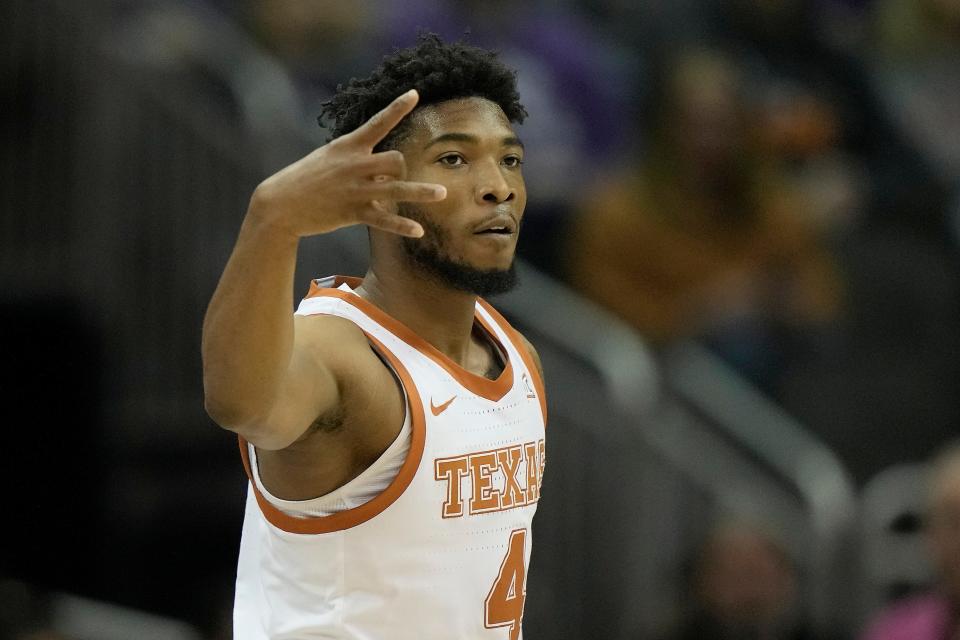 Texas guard Tyrese Hunter celebrates after making a basket during the first half of an NCAA college basketball game against Oklahoma State in the second round of the Big 12 Conference tournament Thursday, March 9, 2023, in Kansas City, Mo. (AP Photo/Charlie Riedel)