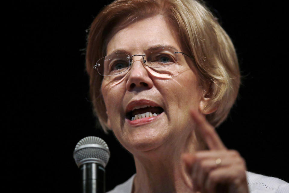 FILE - In this Wednesday, Aug. 8, 2018, file photo, U.S. Sen. Elizabeth Warren, D-Mass., speaks during a town hall-style gathering in Woburn, Ma. A DNA analysis done on Sen. Warren provides strong evidence she has Native American heritage. She provided her test results to The Boston Globe for a story published Monday. (AP Photo/Charles Krupa, File)