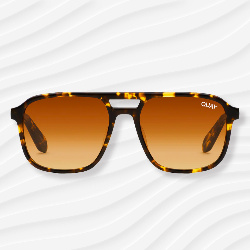 the quay on the fly aviator sunglasses on a white wavy background