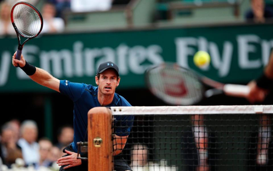 Britain's Andy Murray, left, eyes the ball as Argentina's Juan Martin del Potro volleys during their third round match of the French Open tennis tournament at the Roland Garros stadium - Credit: AP Photo/Christophe Ena