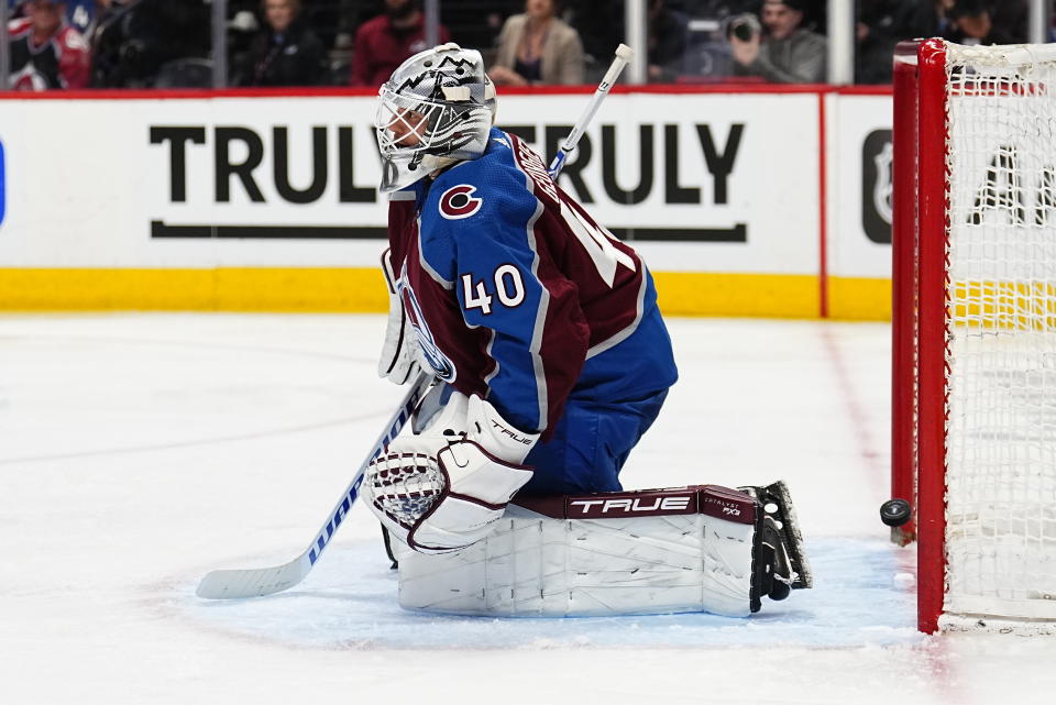 Colorado Avalanche goaltender Alexandar Georgiev lets the puck slip past for a goal by Seattle Kraken center Morgan Geekie during the third period of Game 1 of a first-round NHL hockey playoff series Tuesday, April 18, 2023, in Denver. (AP Photo/Jack Dempsey)