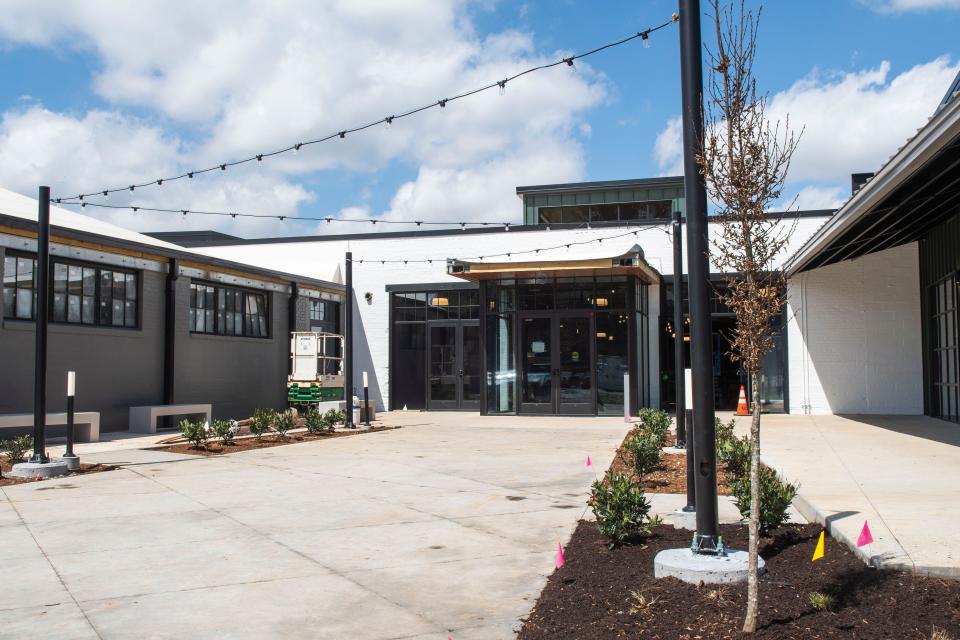 Kern's Food Hall has multiple vendors, multiple stories and multiple entrances, including the one pictured here. While passersby are familiar with the former bakery and its main door fronting Chapman Highway, most visitors will likely enter from the parking lot on the south side of the property.