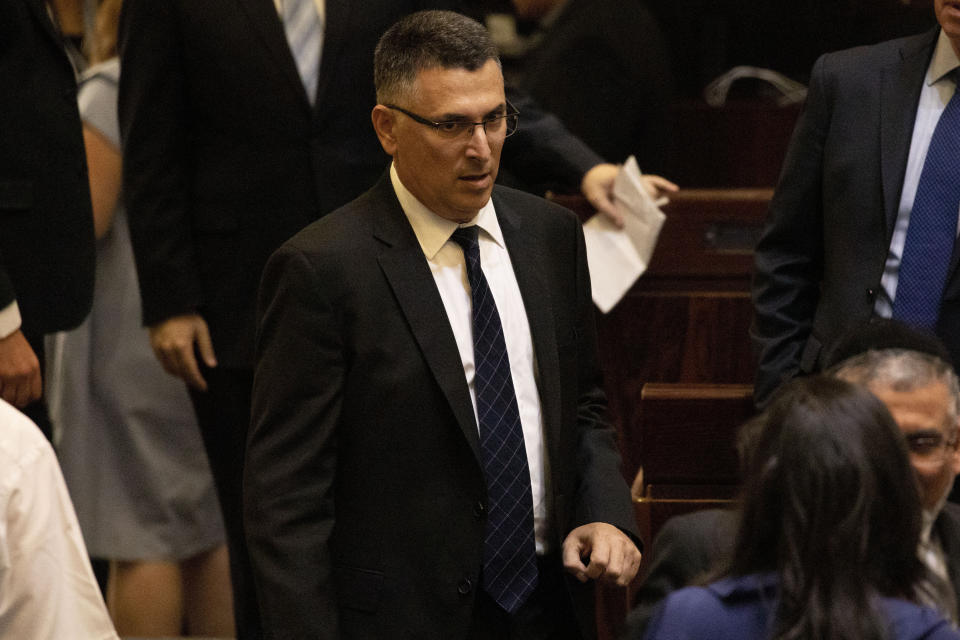 File - In this Thursday, Oct. 3, 2019 file photo, Gideon Saar, attends the swearing-in of the new Israeli parliament in Jerusalem. (AP Photo/Ariel Schalit, File)