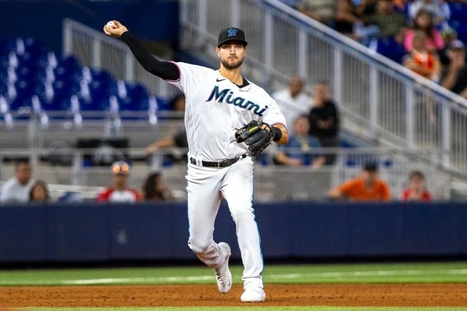 Miami Marlins third baseman Charles Leblanc (83) throws to first base during the ninth inning of an MLB game against the Cincinnati Reds at loanDepot park in the Little Havana neighborhood of Miami, Florida, on Tuesday, August 2, 2022.