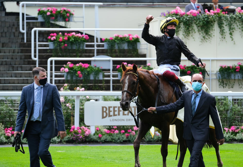 Stradivarius and Frankie Dettori are lead into the winners enclosure after victory in the Gold Cup at Royal Ascot