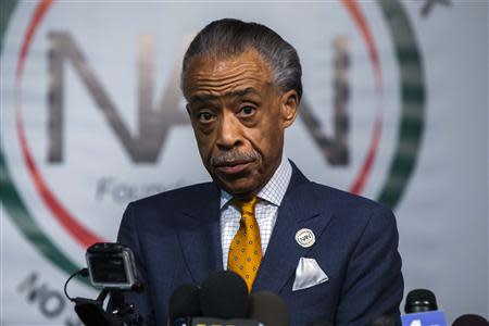 Reverend Al Sharpton attends a news conference held to address local media reports regarding his relationship with the FBI during the 1980s in New York April 8, 2014. REUTERS/Lucas Jackson