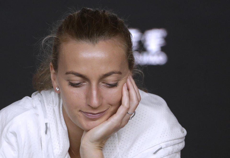 Petra Kvitova of the Czech Republic speaks at a press conference following her loss to Japan's Naomi Osaka in the women's singles final at the Australian Open tennis championships in Melbourne, Australia, Saturday, Jan. 26, 2019. (AP Photo/Mark Schiefelbein)