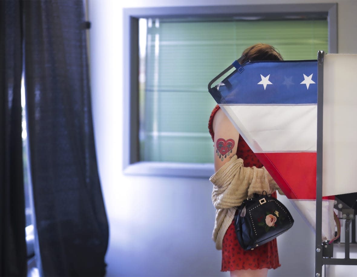 Harlow Livingston votes at Mississippi Boulevard Christian Church in Memphis, Tenn., on Election Day, Tuesday, Nov. 8, 2022. (Patrick Lantrip/Daily Memphian via AP)