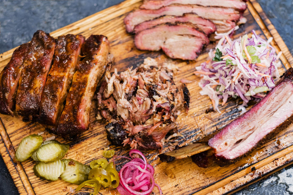 A platter of assorted smoked meats.