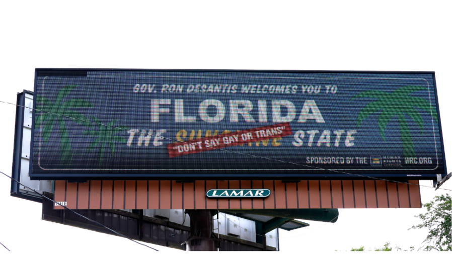 A new billboard welcoming visitors to "Florida: The Sunshine 'Don't Say Gay or Trans' State' is seen Thursday, April 21, 2022, in Winter Park, Fla.