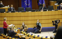 European Commission President Ursula von der Leyen, left, addresses the European Parliament plenary in Brussels, Wednesday, May 27, 2020. The European Union is to unveil Wednesday a massive coronavirus recovery plan worth hundreds of billions of euros to help countries rebuild their ailing economies, but the bloc remains deeply divided over what conditions should be attached to the funds. (AP Photo/Olivier Matthys)