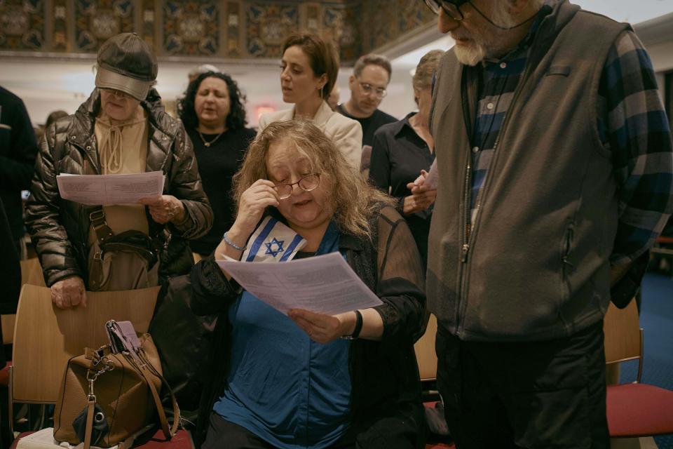 Jews pray during a communal prayer to honor and and offer support for the victims in Israel at B'nai Jeshurun Synagogue on Thursday, Oct. 12, 2023, in New York. (AP Photo/Andres Kudacki)