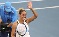 Madison Keys of the United States waves to the crowd after winning her semifinal match against Petra Kvitova of the Czech Republic 3-6, 6-2, 6-3, at the Brisbane International tennis tournament in Brisbane, Australia, Saturday, Jan. 11, 2020. (AP Photo/Tertius Pickard)