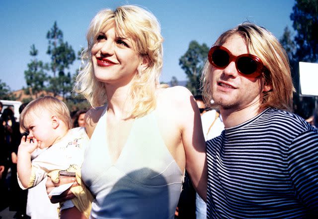 <p>Vinnie Zuffante/Getty</p> Frances Bean Cobain, Courtney Love and Kurt Cobainattending the 1993 MTV Music Video Awards on September 2, 1993