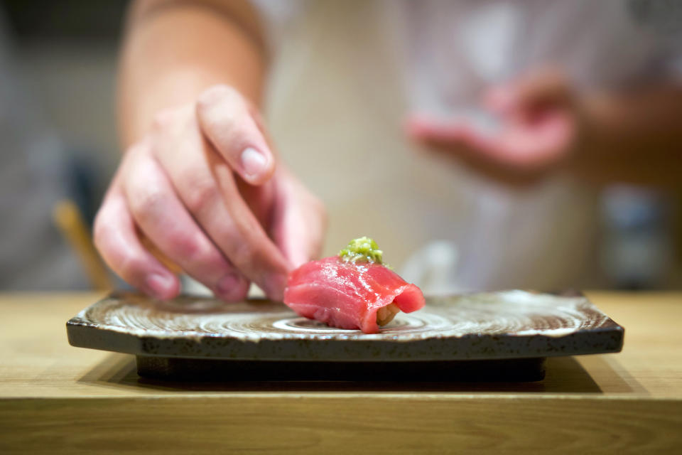 Tuna Sushi with fresh wasabi served on ceramic plate. Enjoy Omakase experience at Japanese Sushi Restaurant. (Chadchai Krisadapong / Getty Images/iStockphoto)