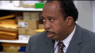 Stanley from "The Office" rolling his eyes.