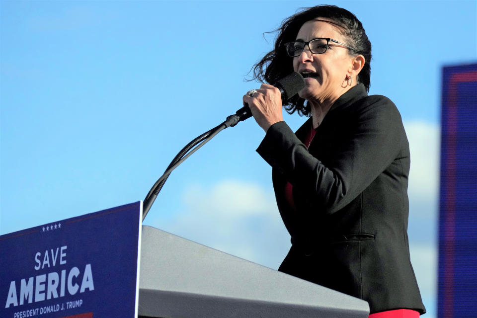 Former South Carolina state lawmaker Katie Arrington speaks at a rally ahead of an appearance by former President Donald Trump on Saturday, March 12, 2022, in Florence, S.C. Arrington — now making a second congressional bid — says a dispute over her access to top-secret government information has been part of a politically motivated smear campaign tied to her support of former President Donald Trump. (AP Photo/Meg Kinnard)