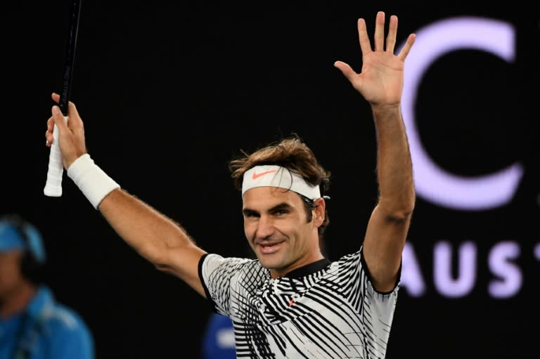 Switzerland's Roger Federer celebrates victory against Germany's Mischa Zverev in the Australian Open quarter-finals in Melbourne on January 24, 2017