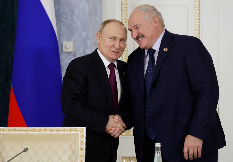 Russian President Vladimir Putin and Belarusian dictator Alexander Lukashenko attend a meeting of the Supreme State Council of the Union State of Russia and Belarus, in Saint Petersburg on Jan. 29, 2024. (Dmitry Astakhov/POOL/AFP via Getty Images)