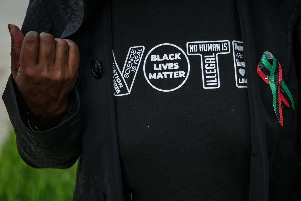 Supporters of the Coalition for Black Student Achievement gather outside of the Fulton-Holland Educational Services Center.