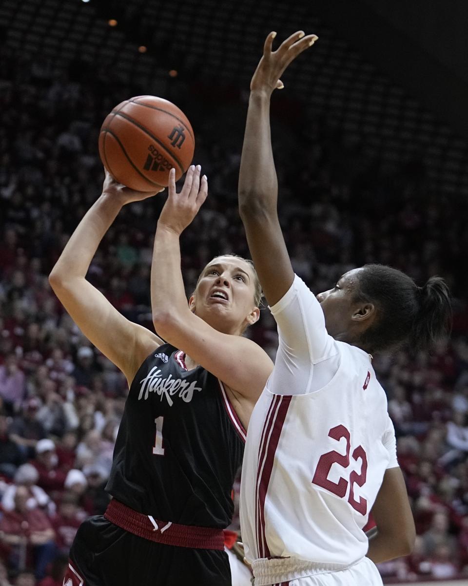 Nebraska's Jaz Shelley (1) shoots over Indiana's Chloe Moore-McNeil (22) during the first half of an NCAA college basketball game, Sunday, Jan. 1, 2023, in Bloomington, Ind. (AP Photo/Darron Cummings)