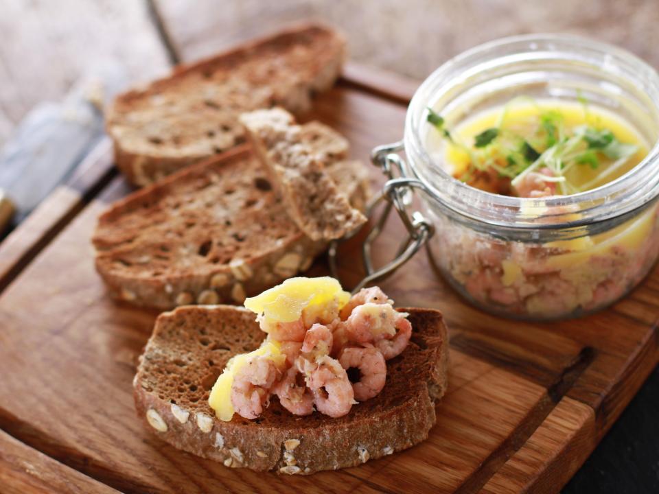 potted shrimp appetizer served with toasted brown bread