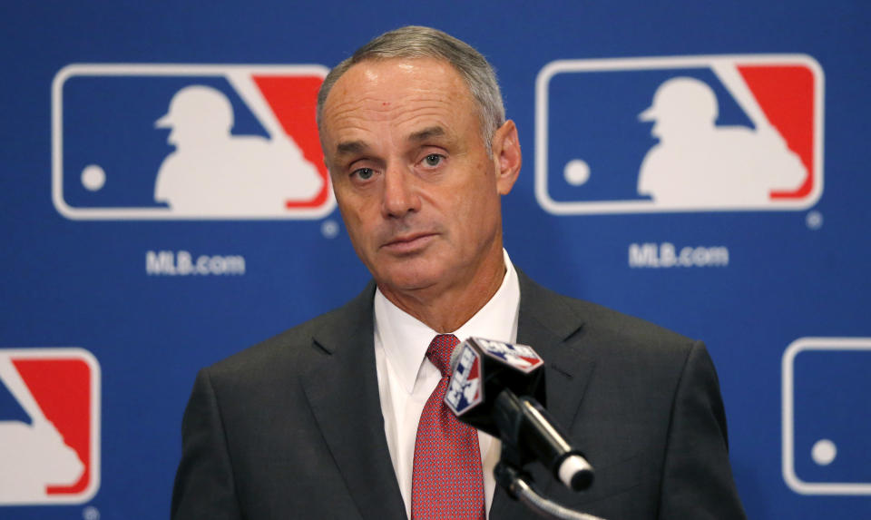 Baseball Commissioner Rob Manfred listens to a question following the two-day meeting of Major League Baseball owners, Thursday, Aug. 17, 2017, in Chicago. (AP)