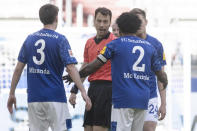 Schalke's Weston McKennie wears an armband with the words "....for George" during the German Bundesliga soccer match between FC Schalke 04 and Werder Bremen in Gelsenkirchen, Germany, Saturday, May 30, 2020. Because of the coronavirus outbreak all soccer matches of the German Bundesliga take place without spectators. (Bernd Thissen/pool via AP)