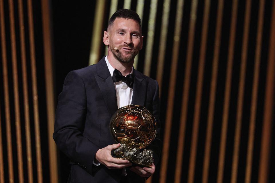 Inter Miami CF's Argentine forward Lionel Messi reacts on stage with his trophy as he receives his 8th Ballon d'Or award during the 2023 Ballon d'Or France Football award ceremony at the Theatre du Chatelet in Paris on October 30, 2023. (Photo by FRANCK FIFE / AFP) (Photo by FRANCK FIFE/AFP via Getty Images)