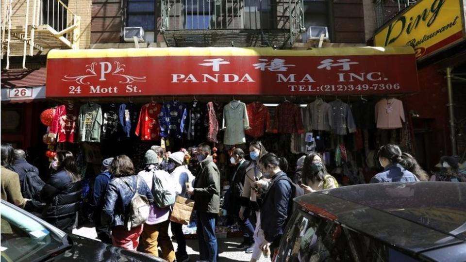 Shoppers fill the sidewalks in Chinatown in New York, New York, USA, 03 April 2021. It was estimated that almost 90 percent of businesses in Chinatown were shut down during the height of the COVID-19 pandemic in 2020, but since the Chinese New Year businesses have started to reopen and customers have begun to return