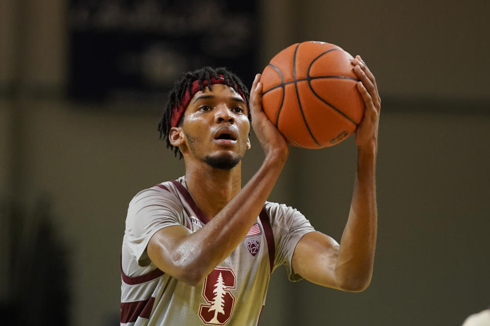 Ziaire Williams with the ball in his hands in a shooting motion.