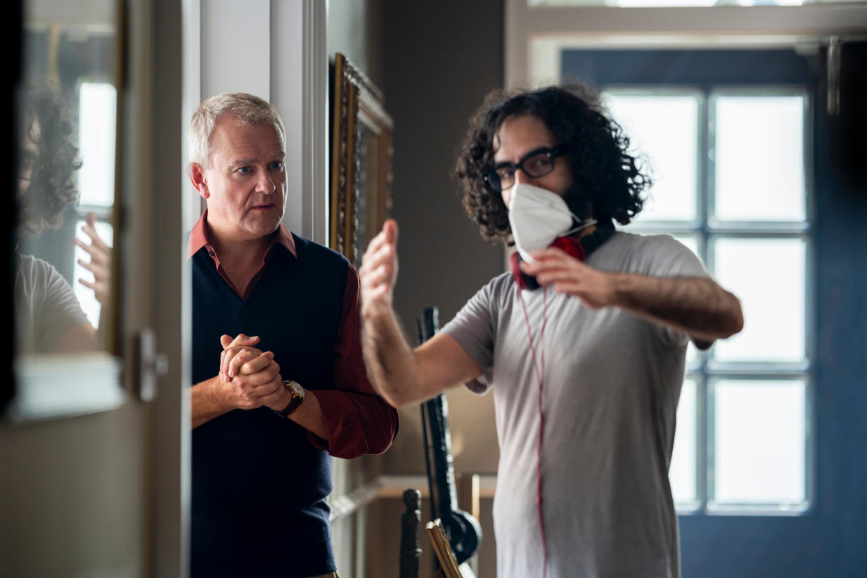 Babak Anvari directs Hugh Bonneville on the London set of I Came By. (Netflix)