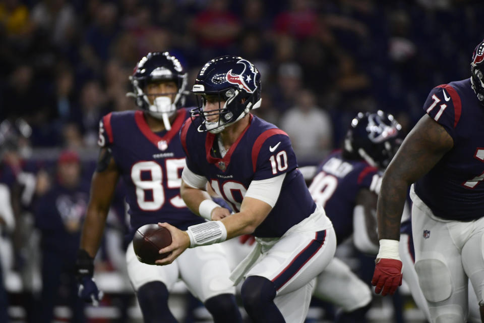 Houston Texans quarterback Davis Mills (10) looks to hand the ball off during the first half of an NFL football game against the Carolina Panthers Thursday, Sept. 23, 2021, in Houston. (AP Photo/Justin Rex)