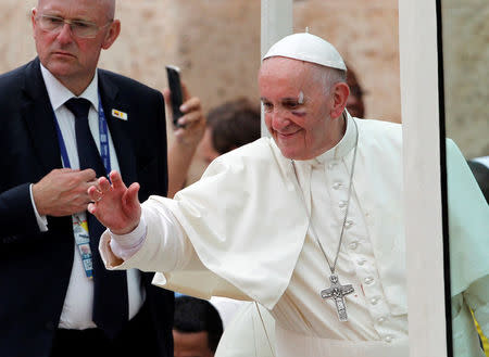 Pope Francis greets faithfuls as he travels in the popemobile through Cartagena, Colombia, September 10, 2017. REUTERS/Federico Rios