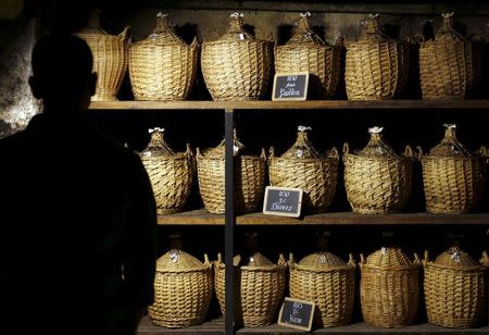 Demijohns are stored in a cellar used for storing rare and old cognac at the Hennessy factory in Cognac, southwestern France, November 5, 2015. REUTERS/Regis Duvignau