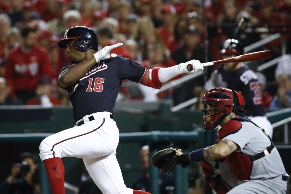 Washington Nationals' Victor Robles hits a single during the third inning of Game 3 of the baseball National League Championship Series against the St. Louis Cardinals Monday, Oct. 14, 2019, in Washington. (AP Photo/Patrick Semansky)