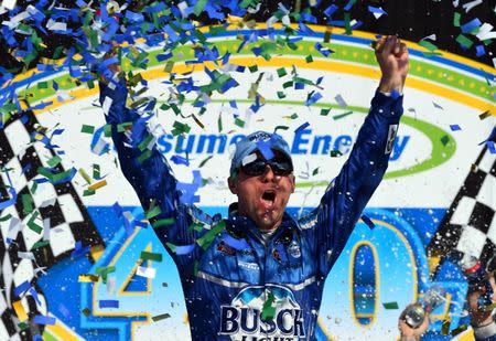 Aug 12, 2018; Brooklyn, MI, USA; NASCAR Cup Series driver Kevin Harvick (4) reacts after winning the Consumers Energy 400 at Michigan International Speedway. Mandatory Credit: Mike DiNovo-USA TODAY Sports